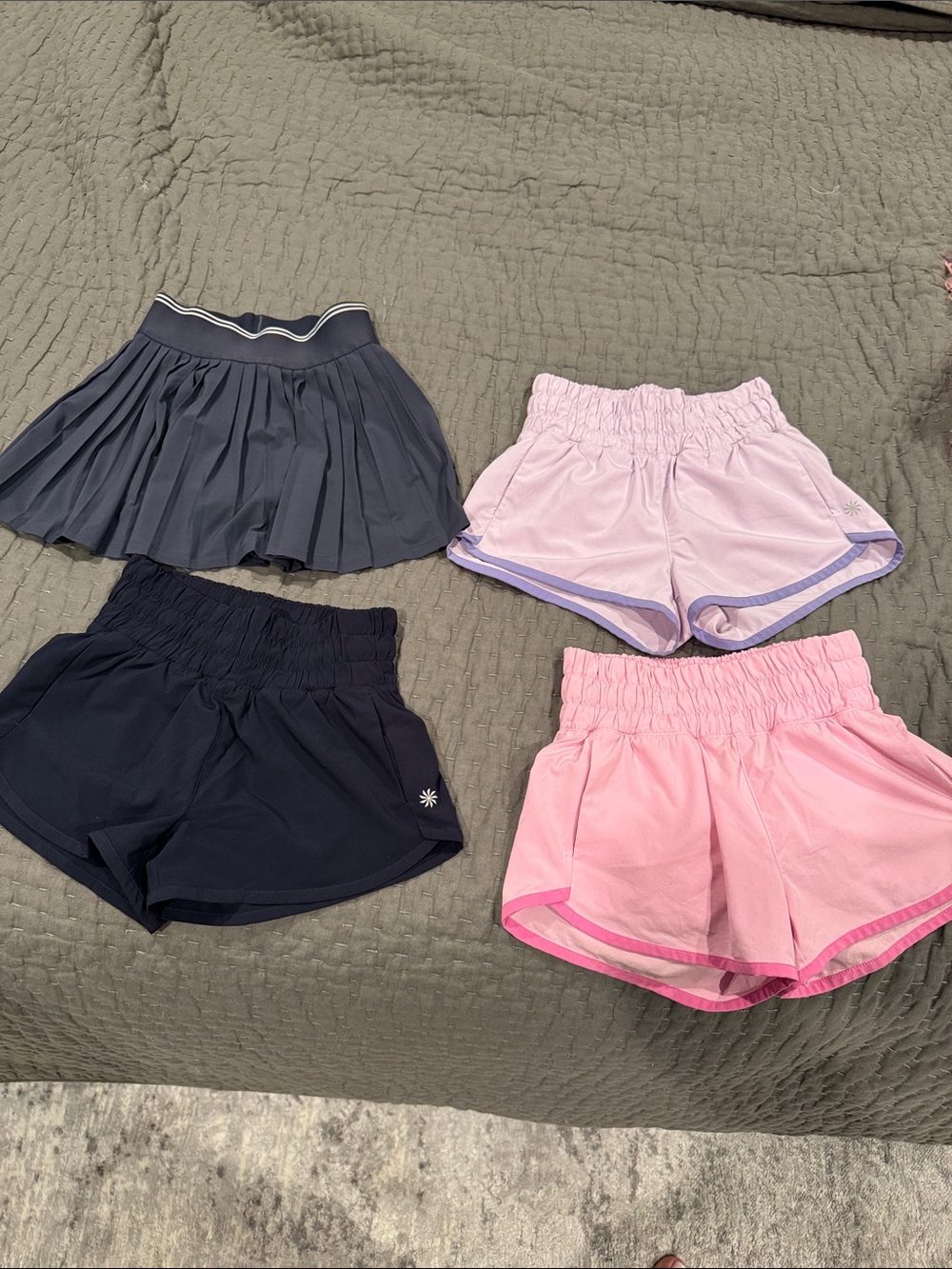 3 pairs of girls athleta shorts and one tennis skirt size 6